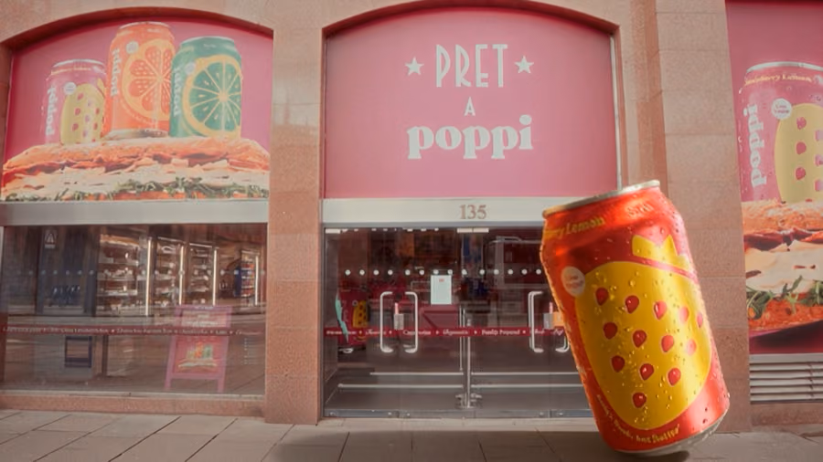 Pret a Manger storefront on Princes Street, Edinburgh, with a 3D animated can of Poppi